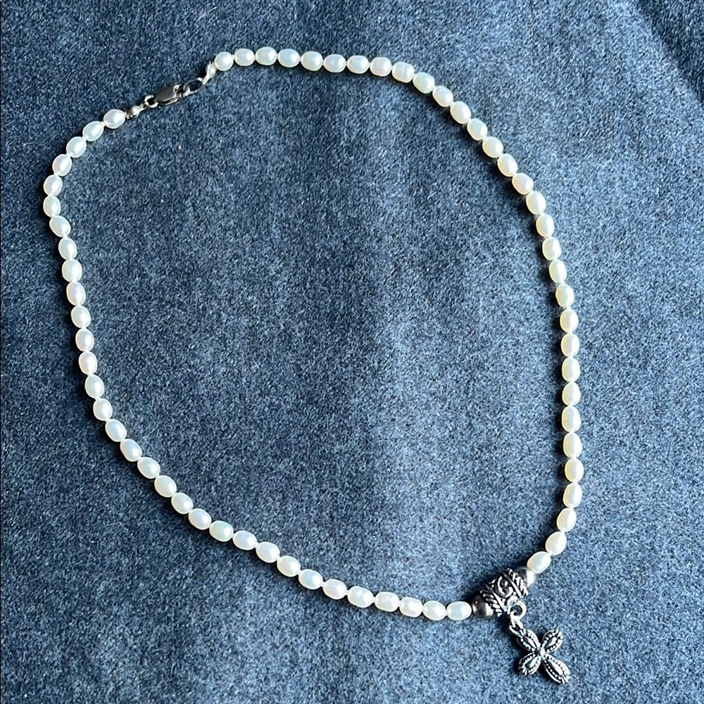 Pearl and silver tone cross necklace